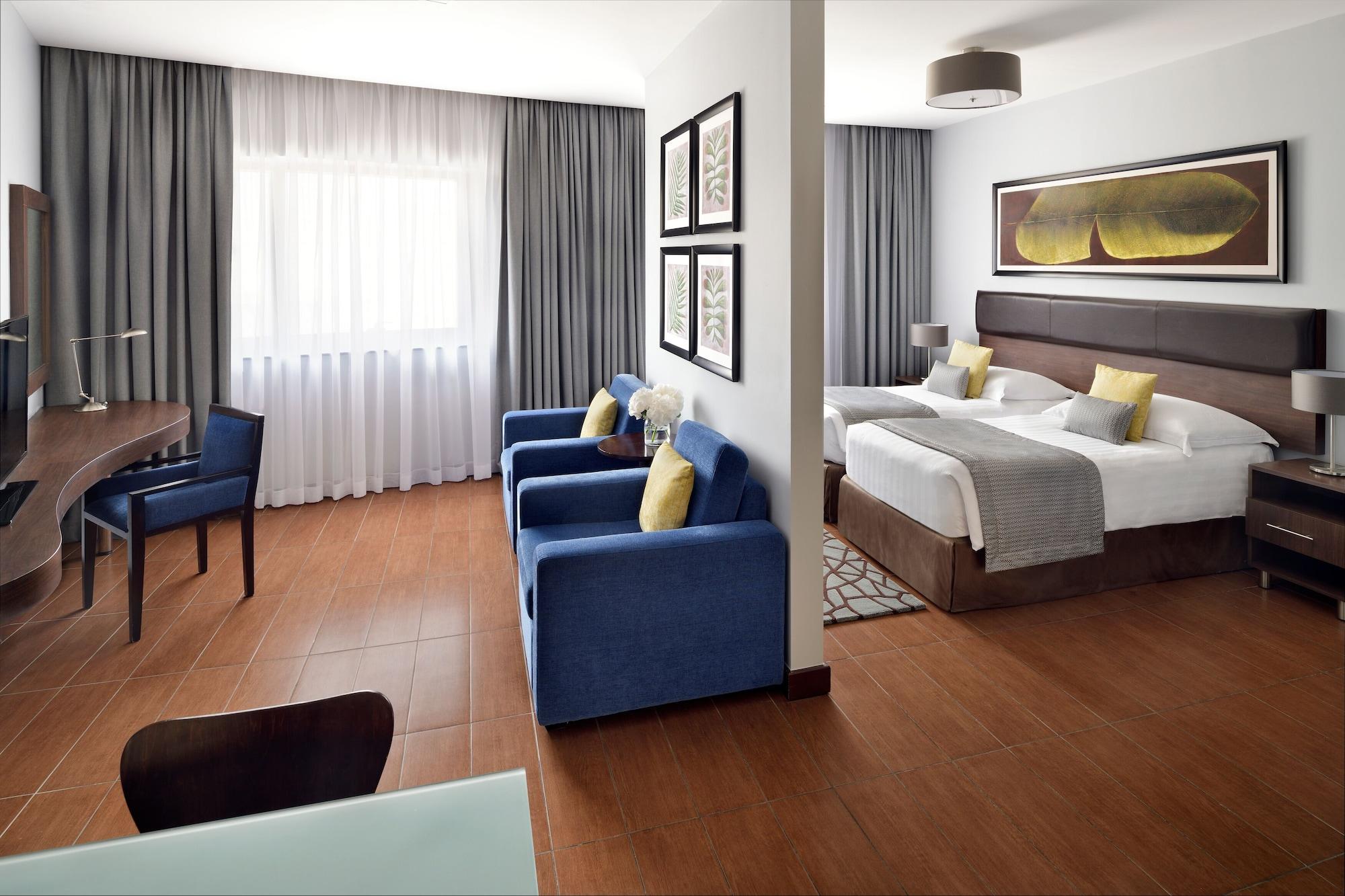 Moevenpick Hotel Apartments Al Mamzar Дубай Екстериор снимка