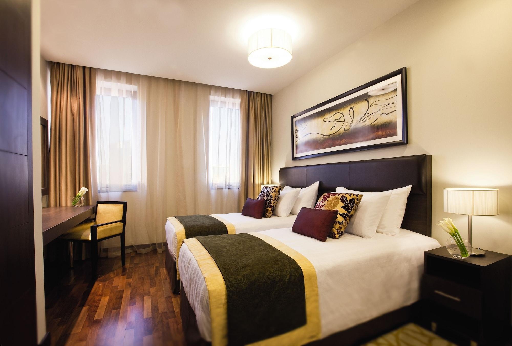 Moevenpick Hotel Apartments Al Mamzar Дубай Екстериор снимка Deluxe Room